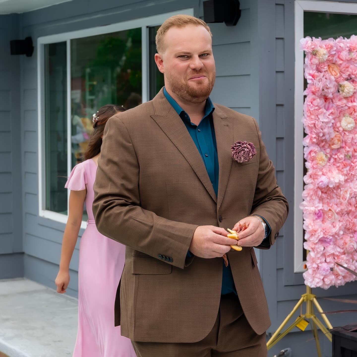 Andrew in a fancy shirt, smiling at the camera.